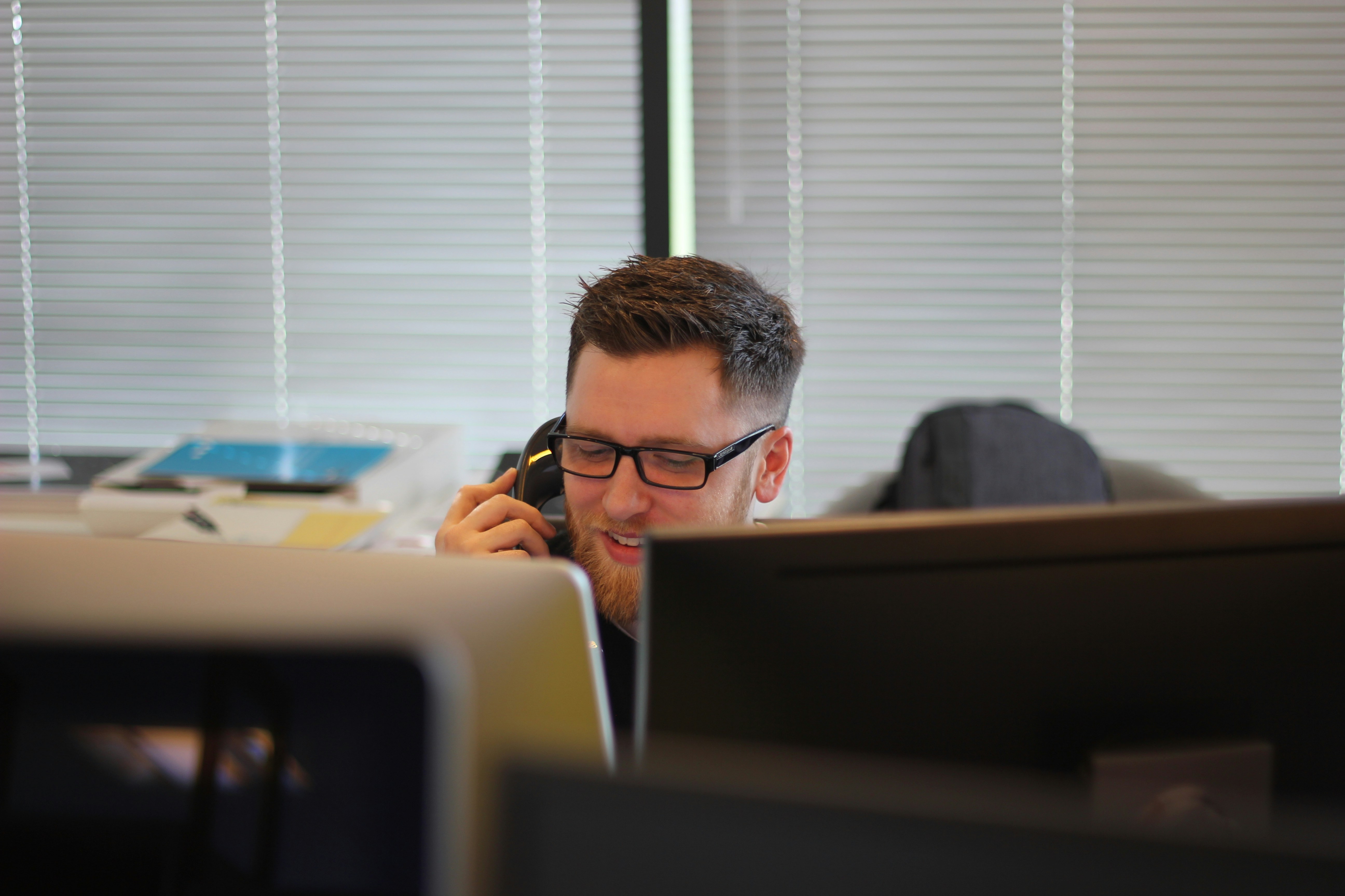 Live chat and email support for customers Customer support agent with headset